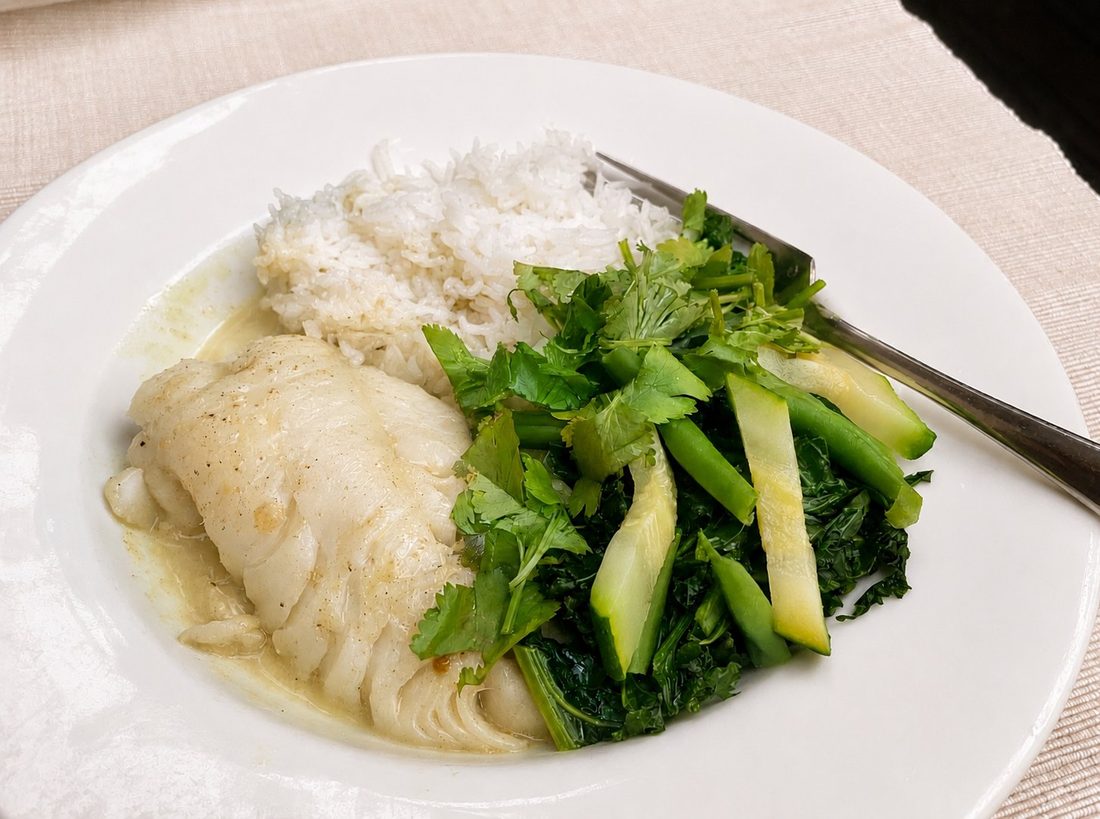 Coconut, coriander and lime poached fish with lime rice