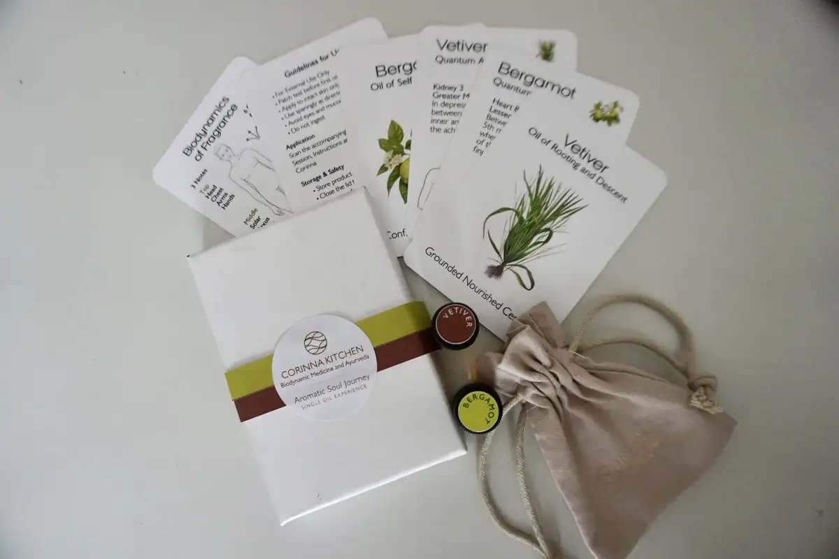 The Vetiver and Bergamot oils with their illustrated cards, boxed